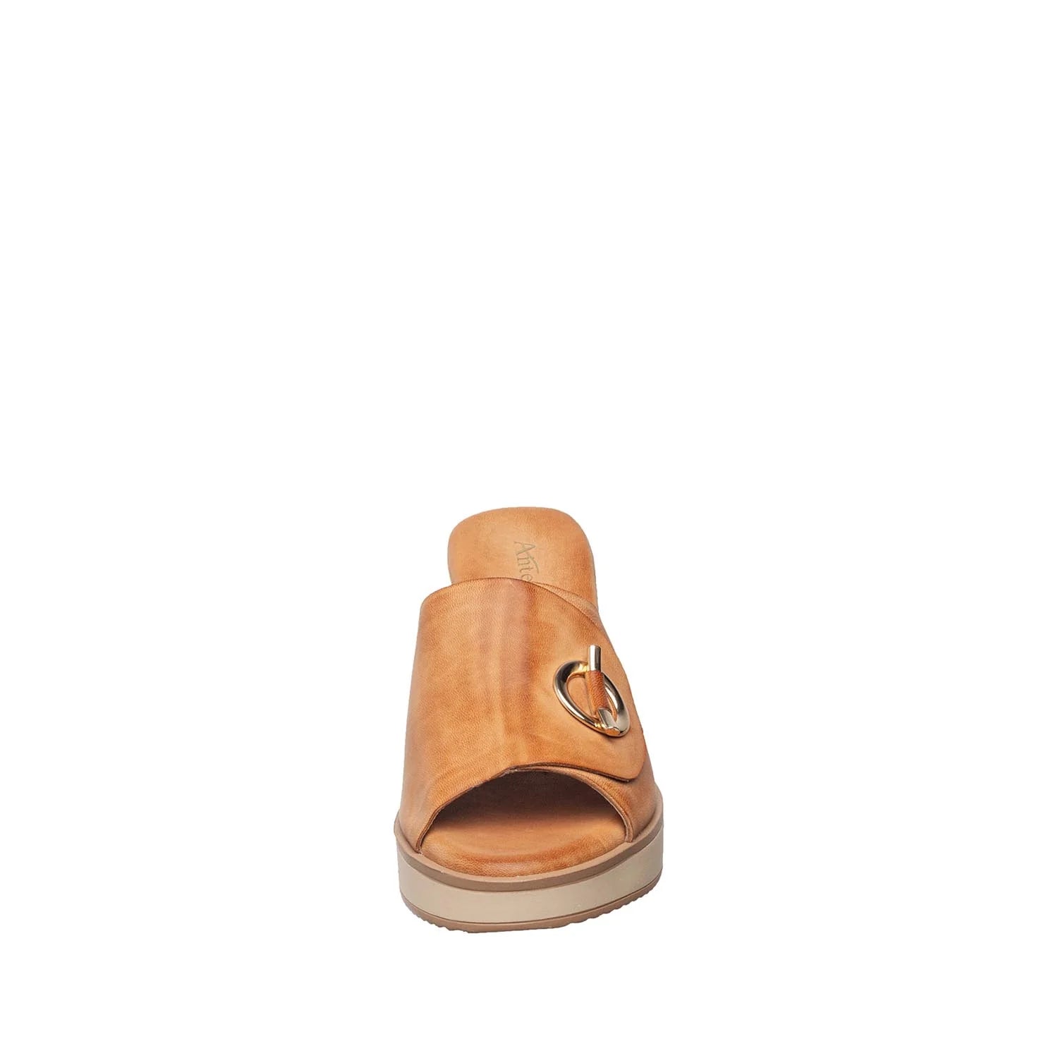 Tan sandal with a heart-shaped buckle on a white background