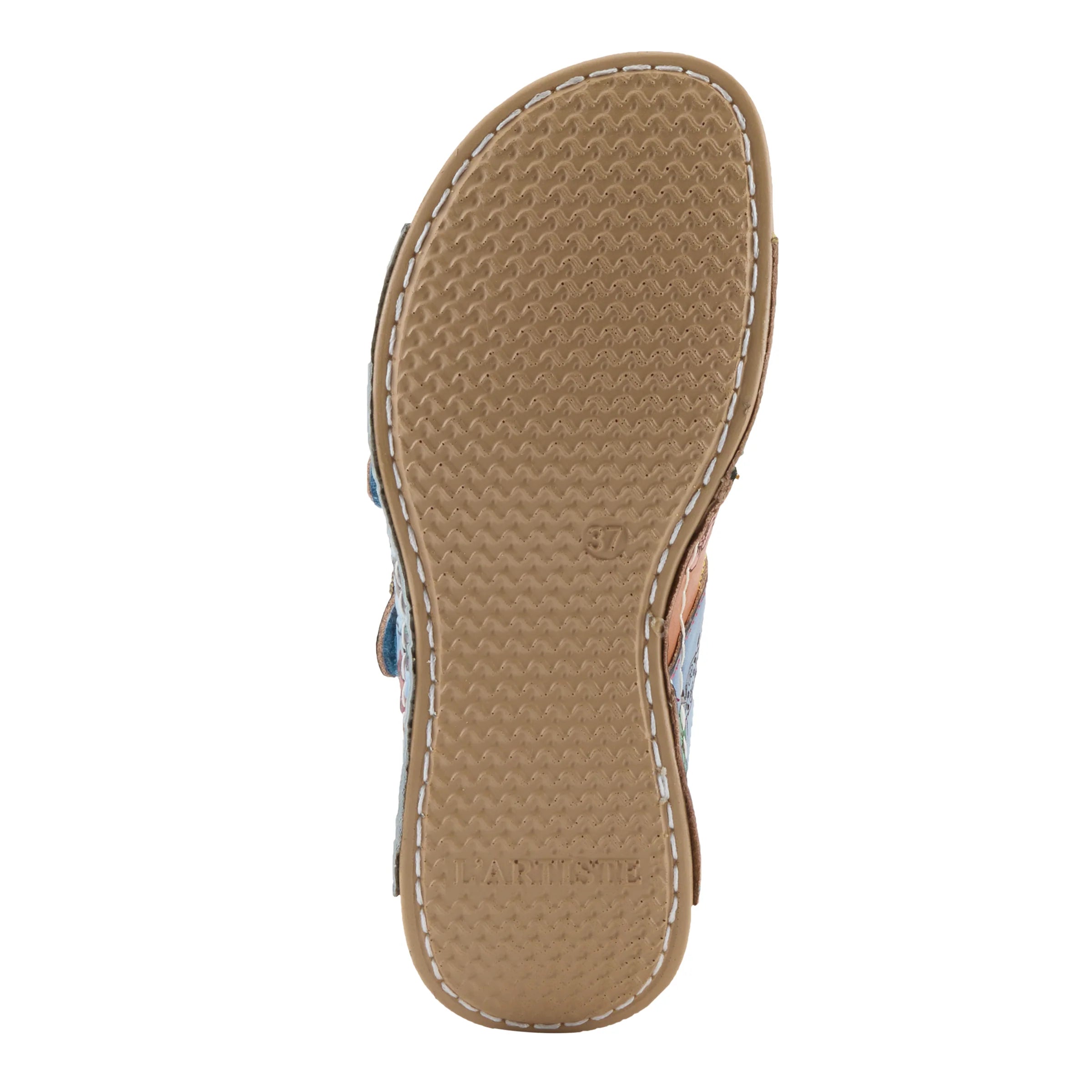 Tan sandal sole with brand name on a white background