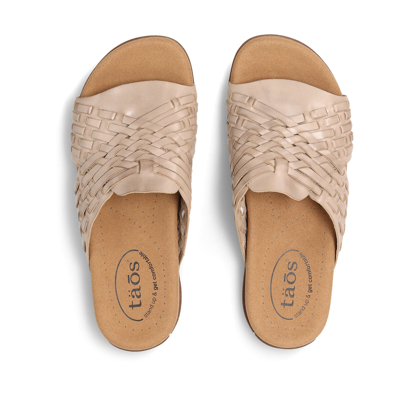 Pair of beige sandals with woven design on a white background