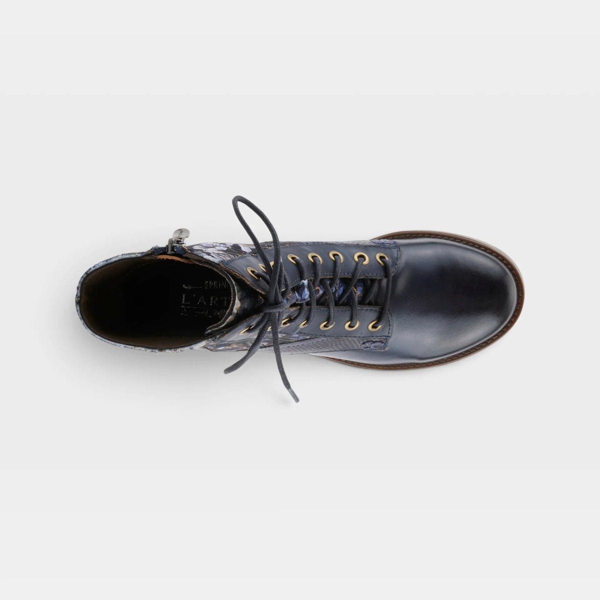 A single dark navy blue leather lace-up boot shown from a top-down view on a light gray background.
