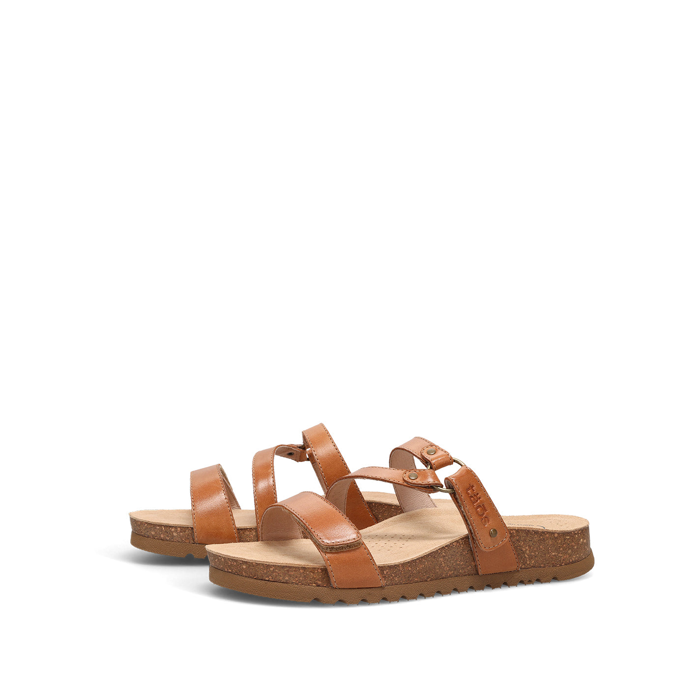 Pair of brown sandals on a white background