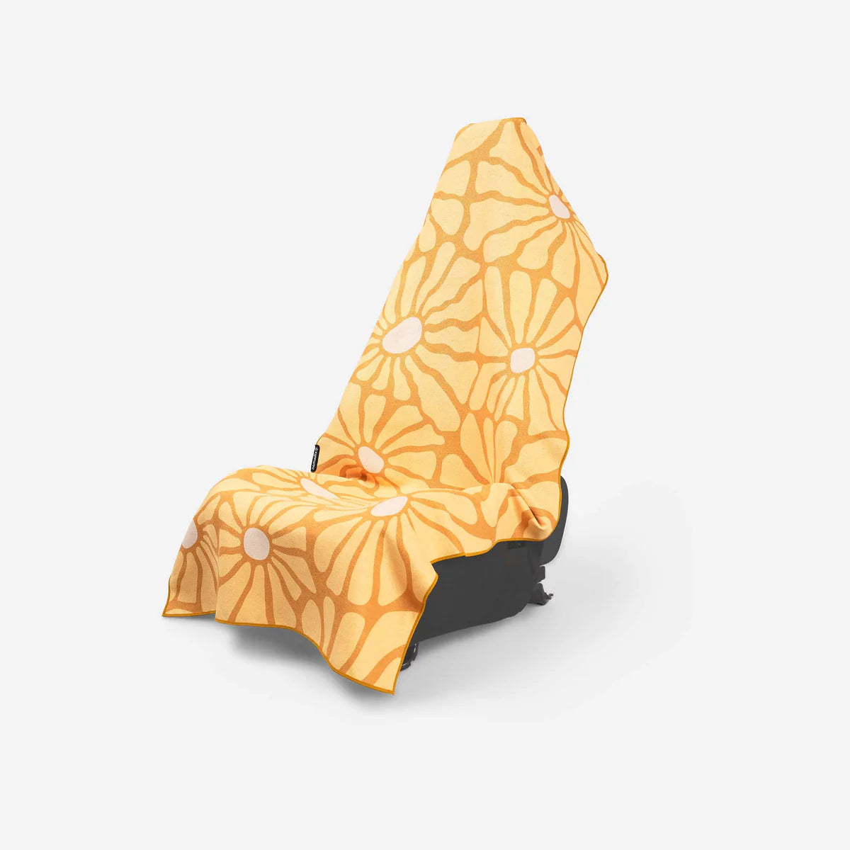 A car seat cover with a retro daisy pattern in yellow and orange, draped over a black car seat against a light gray background.