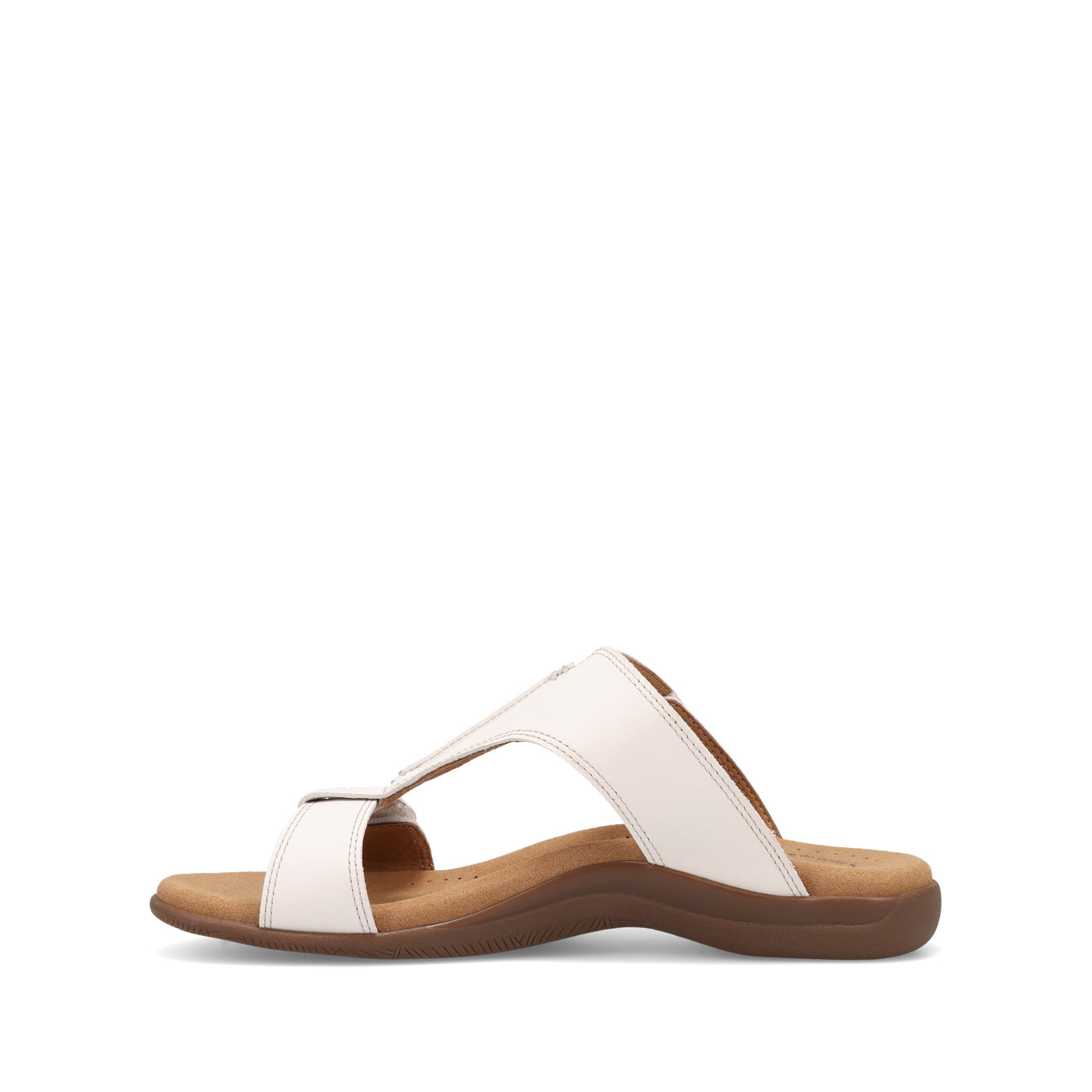 White sandal with brown sole on a white background
