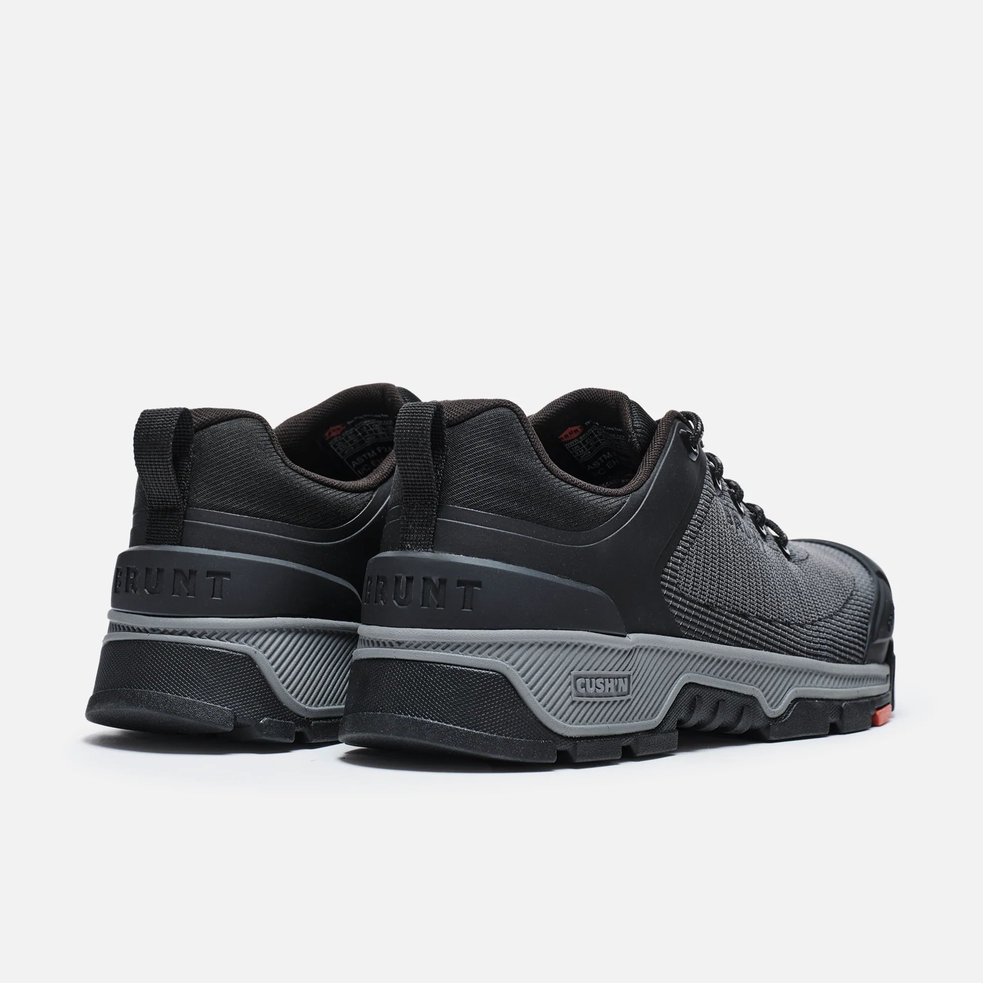 Black and gray shoes with 'GANT' branding on a white background
