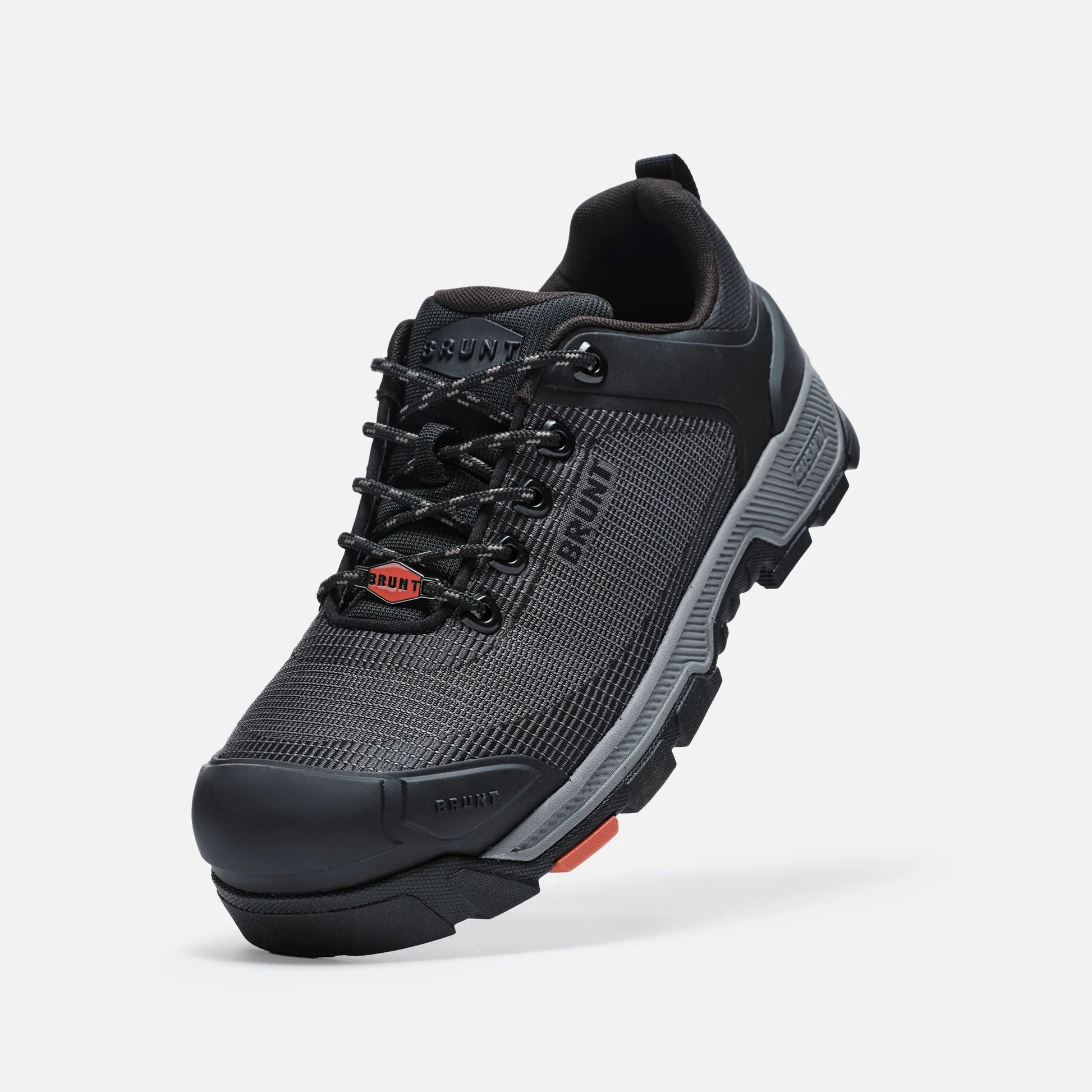 Black and gray sneaker with brand logo on a white background