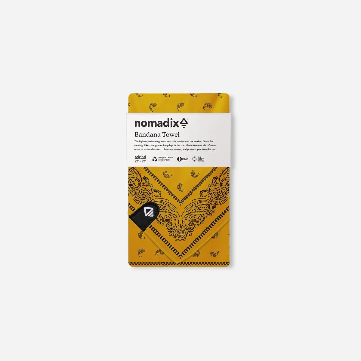 Yellow bandana towel packaging with 'nomadix' branding on a white background