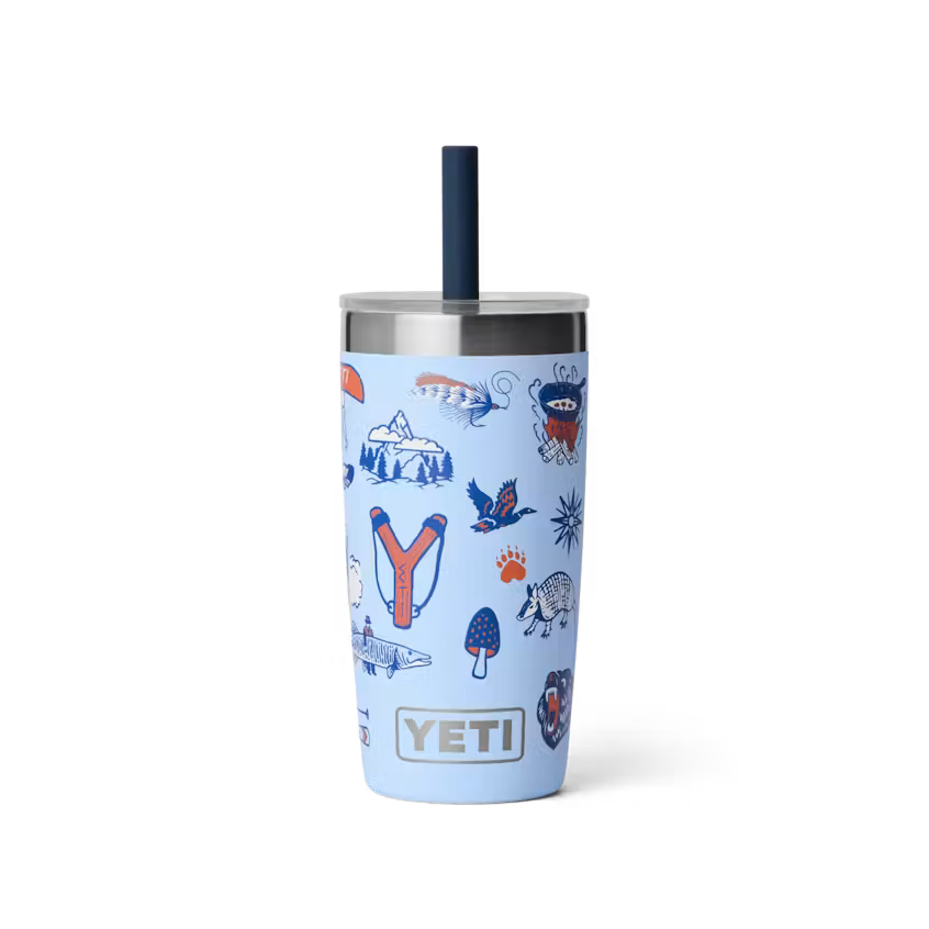Yeti tumbler with a blue design and straw on a white background