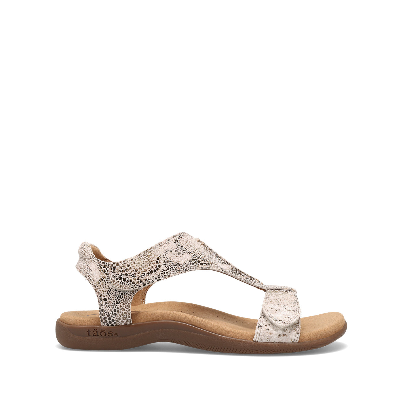 Single sandal with floral pattern on a white background