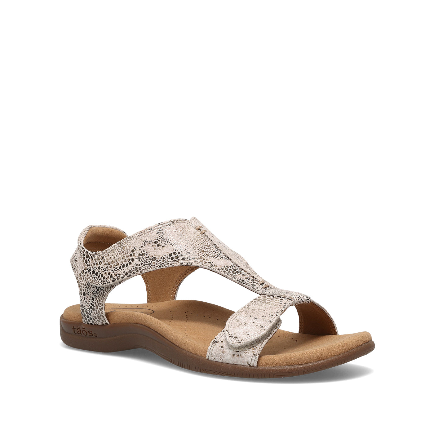 Beige sandal with brown sole on a white background