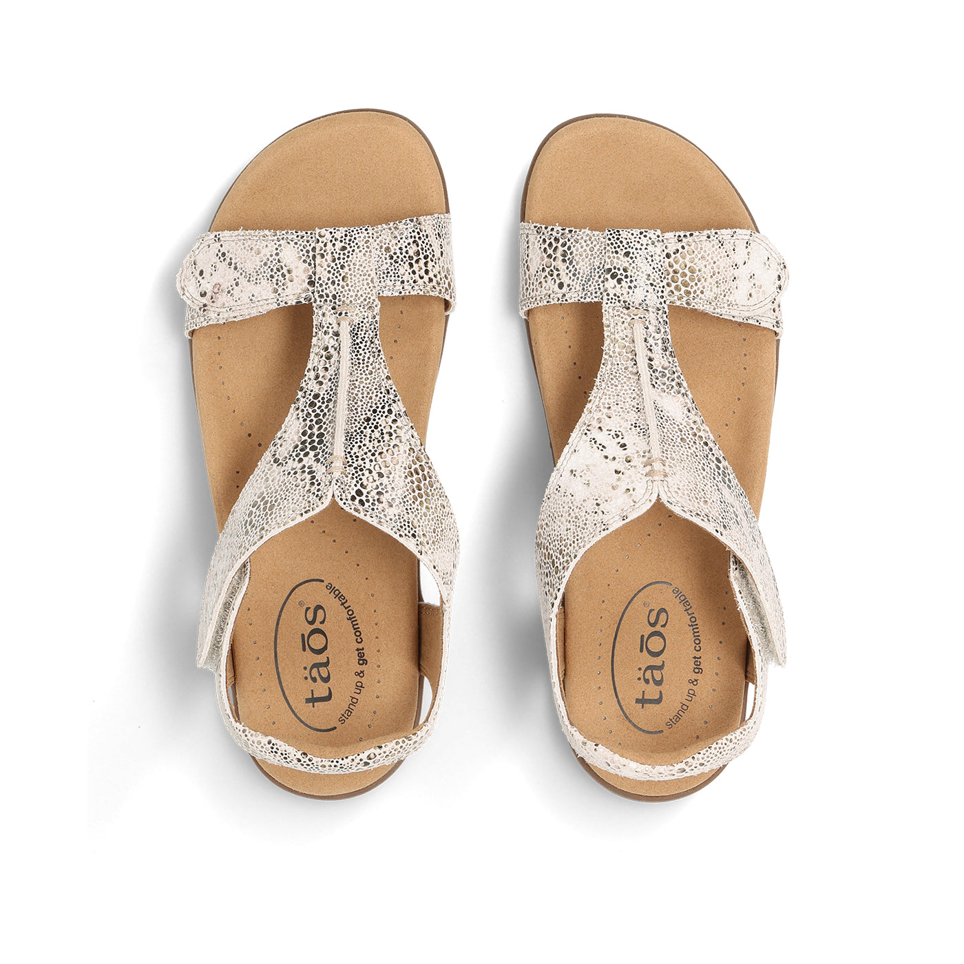 Pair of silver glitter sandals on a white background