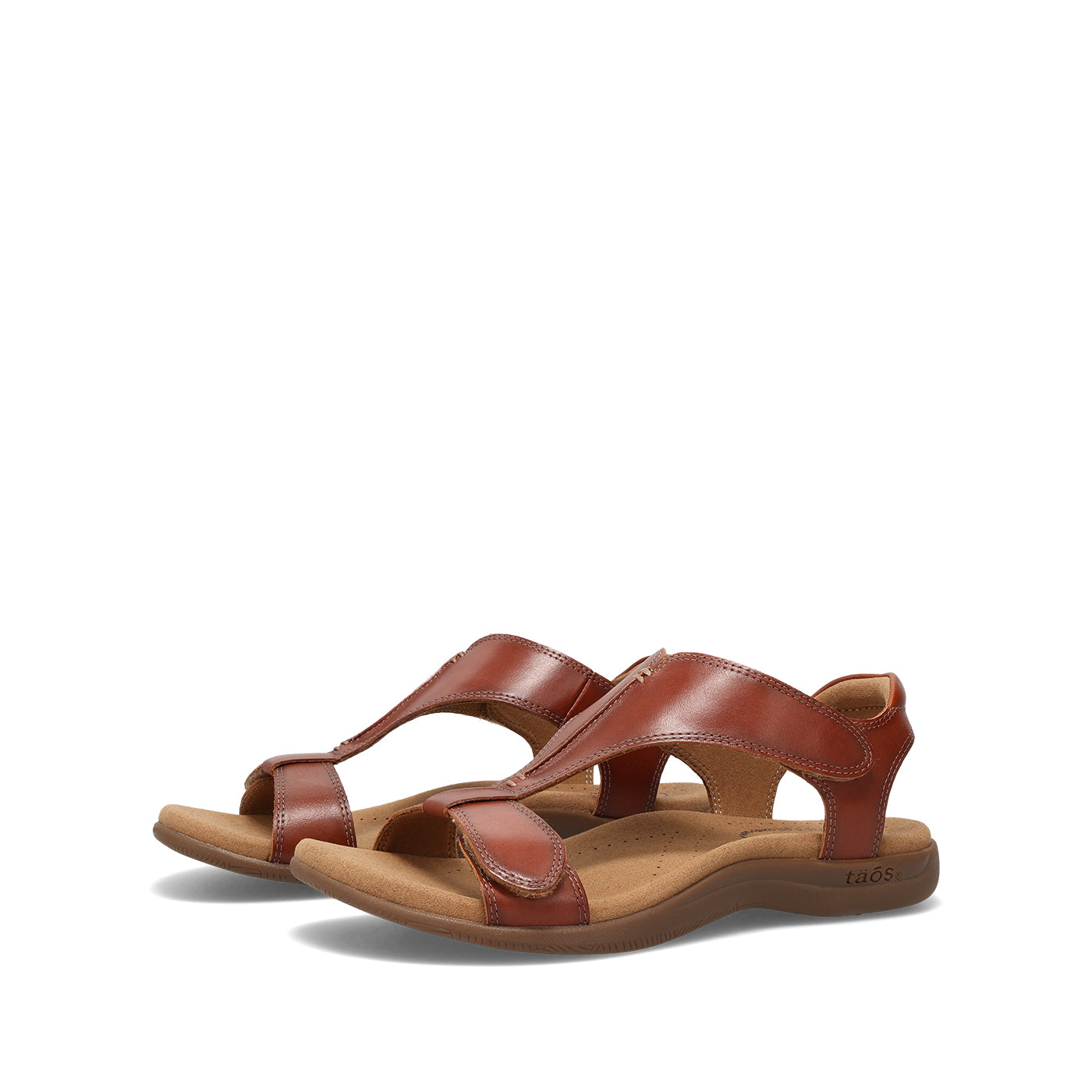 Pair of brown sandals on a white background