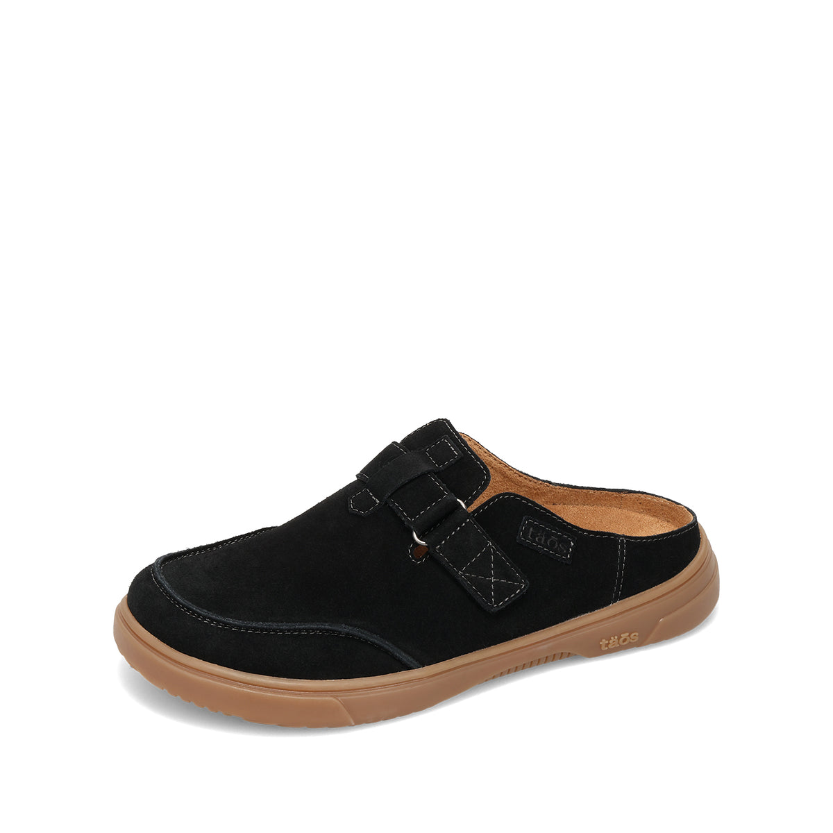 A single black suede mule shoe with a brown gum sole, featuring a hook-and-loop strap closure and a small leather brand tab on the side.