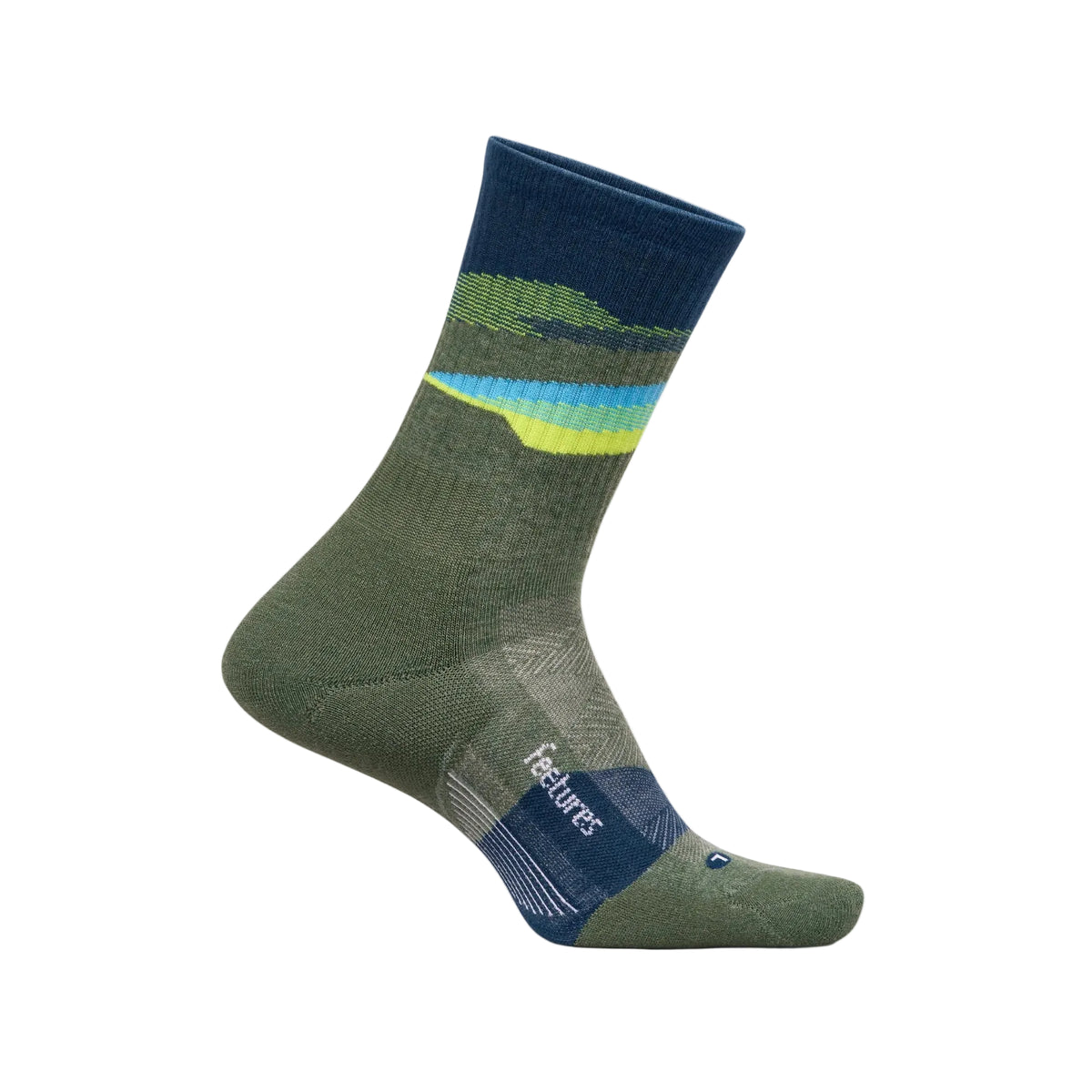 A single crew sock shown on a foot form against a light beige background. The sock is olive green with a mountain-like wave pattern in navy, green, and yellow near the cuff, and features the 'features' brand name on the heel.