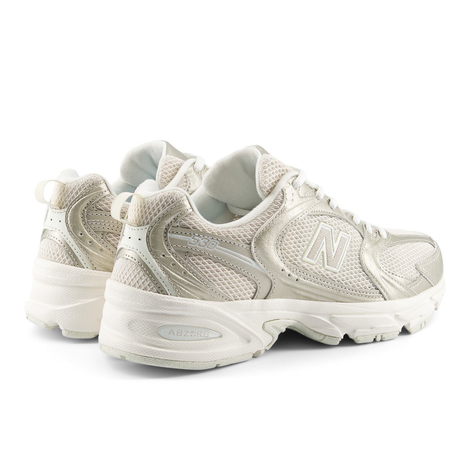Pair of white sneakers with New Balance logo on a white background