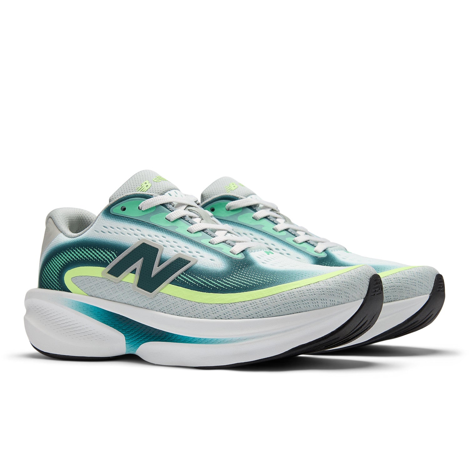 Pair of New Balance running shoes with green and gray design on a white background