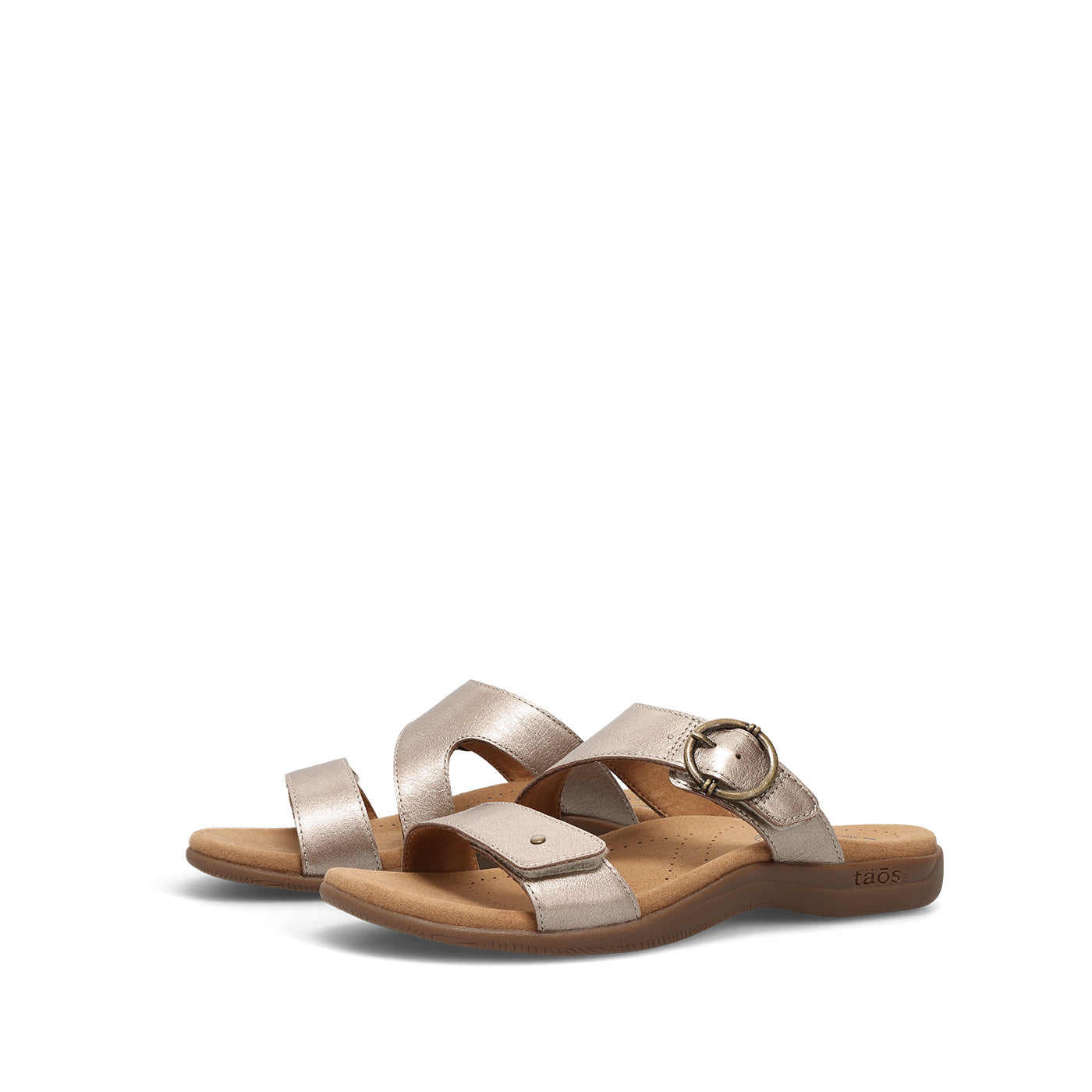 Pair of metallic sandals on a white background