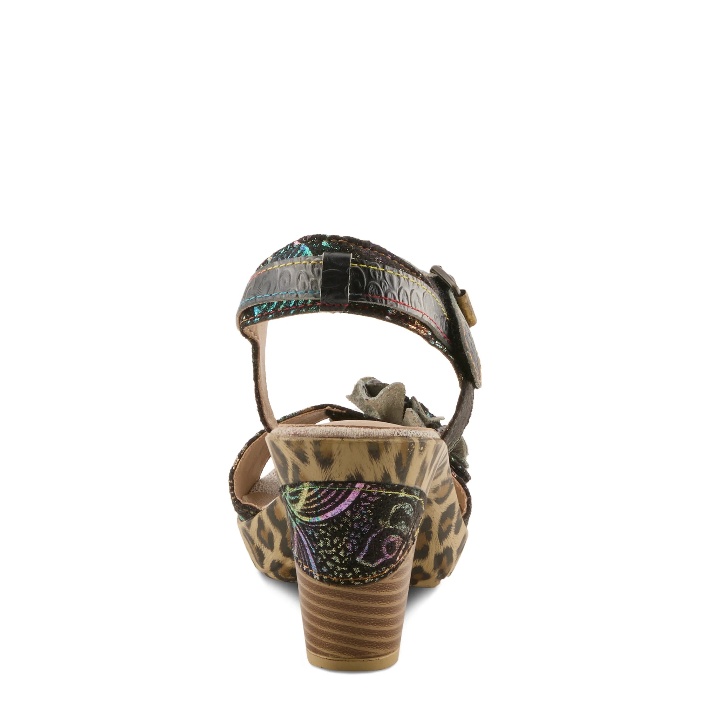 Leopard print sandal with decorative strap on a white background
