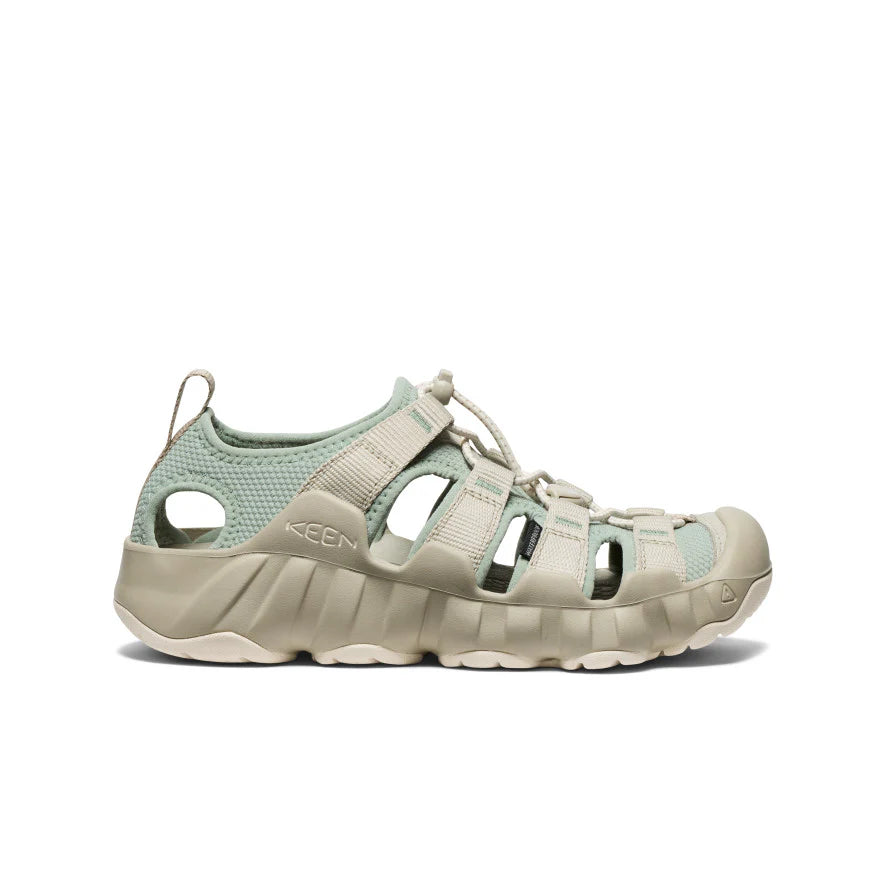 Beige and light blue sandal with KEEN branding on a white background