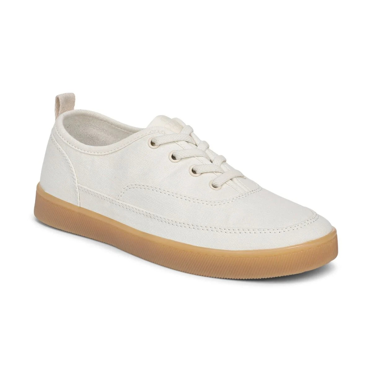 White sneaker with a brown sole on a white background