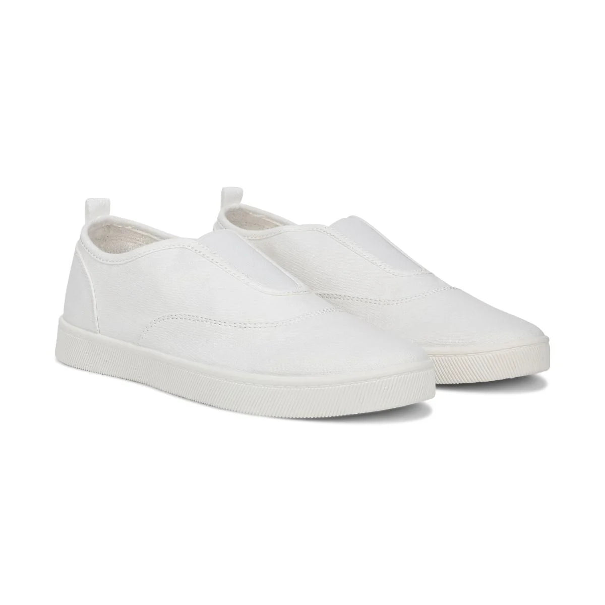 Pair of white slip-on sneakers on a white background