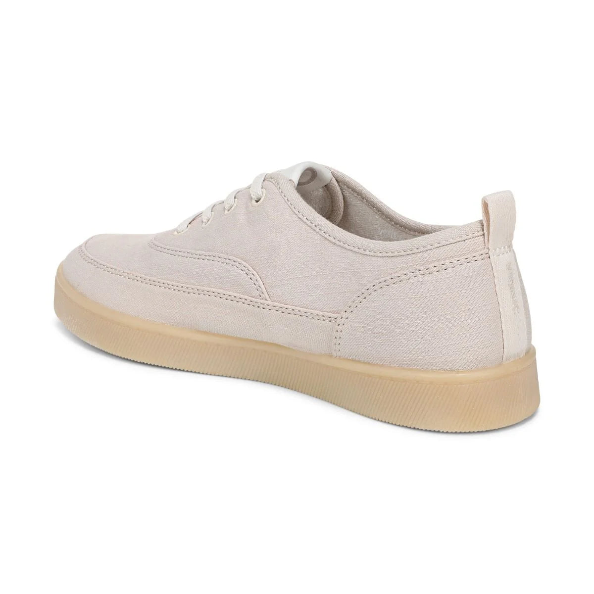 Beige sneaker with a white background