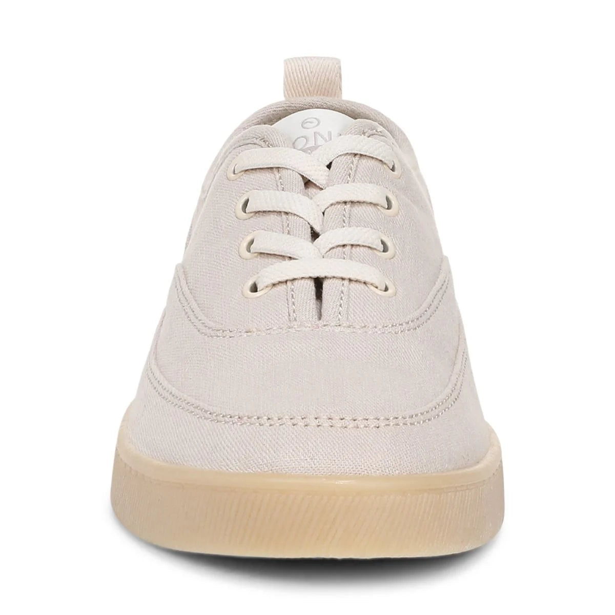 Beige sneaker with white laces on a white background