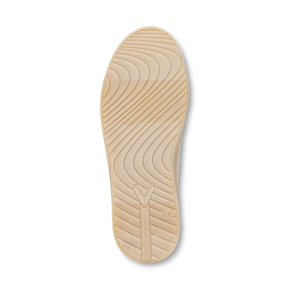 Beige shoe sole with tread pattern on a white background
