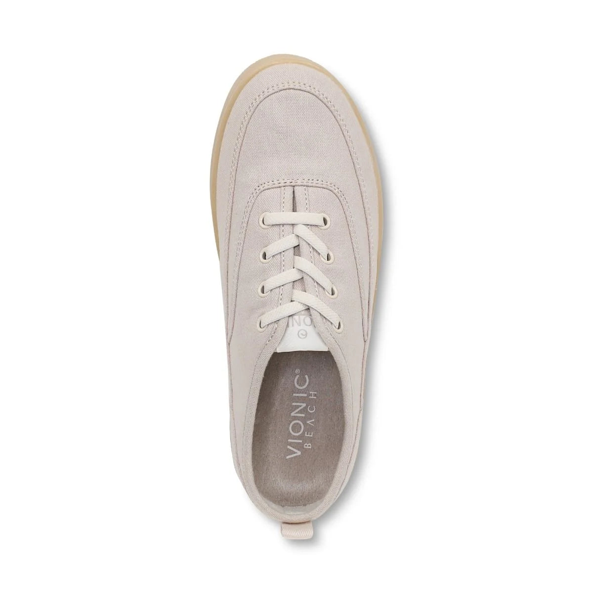 Beige sneaker with white laces on a white background