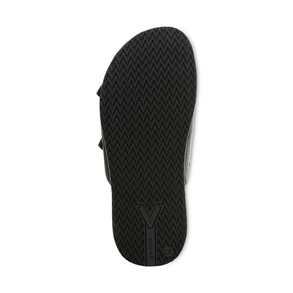 Black sandal with a textured sole on a white background