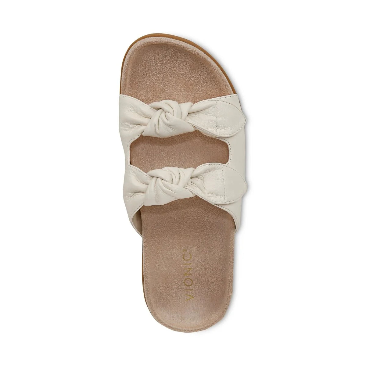 Beige sandal with a bow on a white background