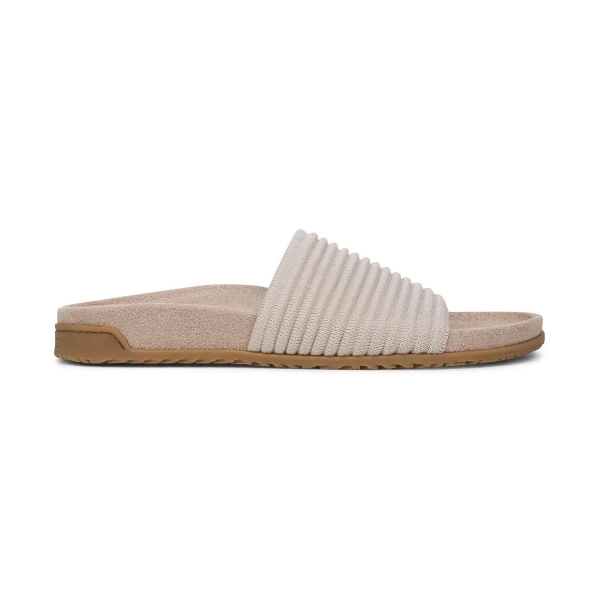 Beige slide sandal with a textured strap on a white background