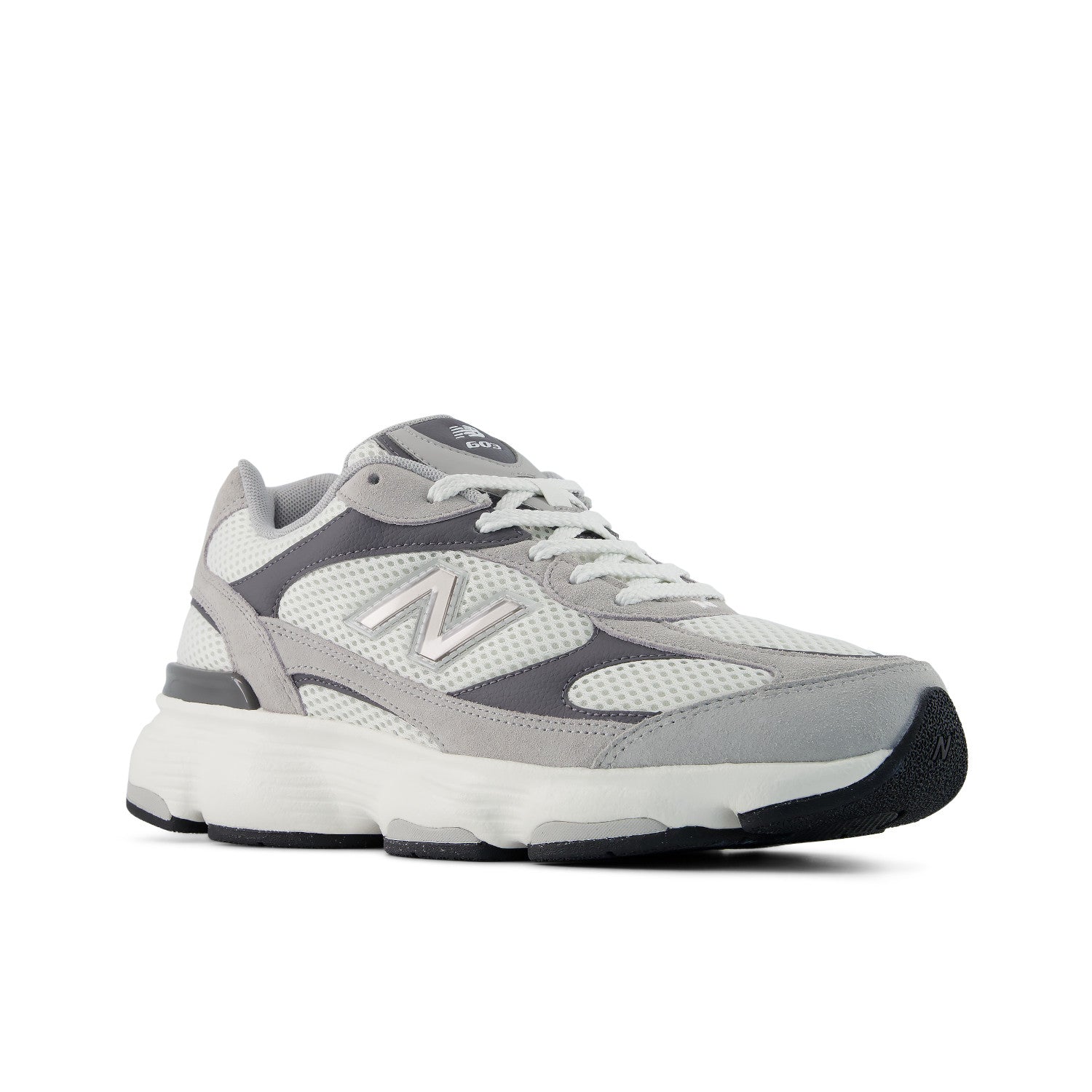 Gray and white sneaker with New Balance logo on a white background