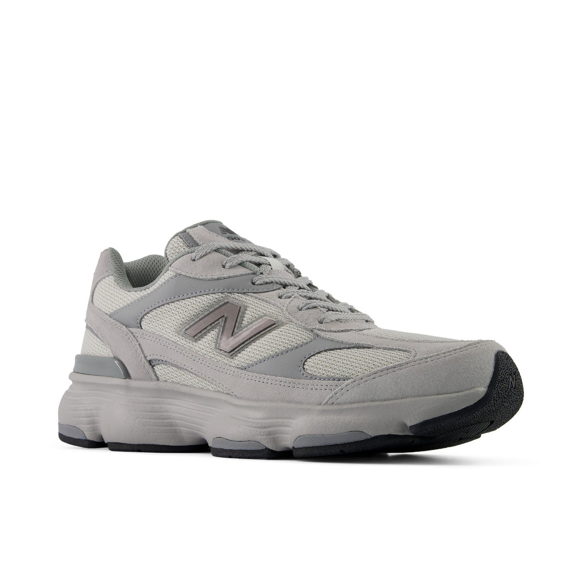 A light gray New Balance running shoe with a chunky gray and black sole, shown from a side profile on a white background.