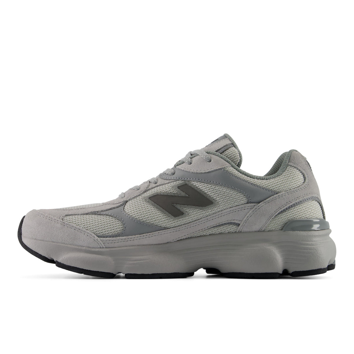 A light gray New Balance sneaker shown from the side profile against a solid white background.