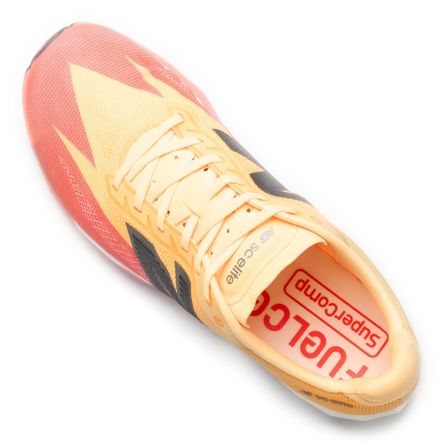 Yellow and red sports shoe with visible branding on a white background