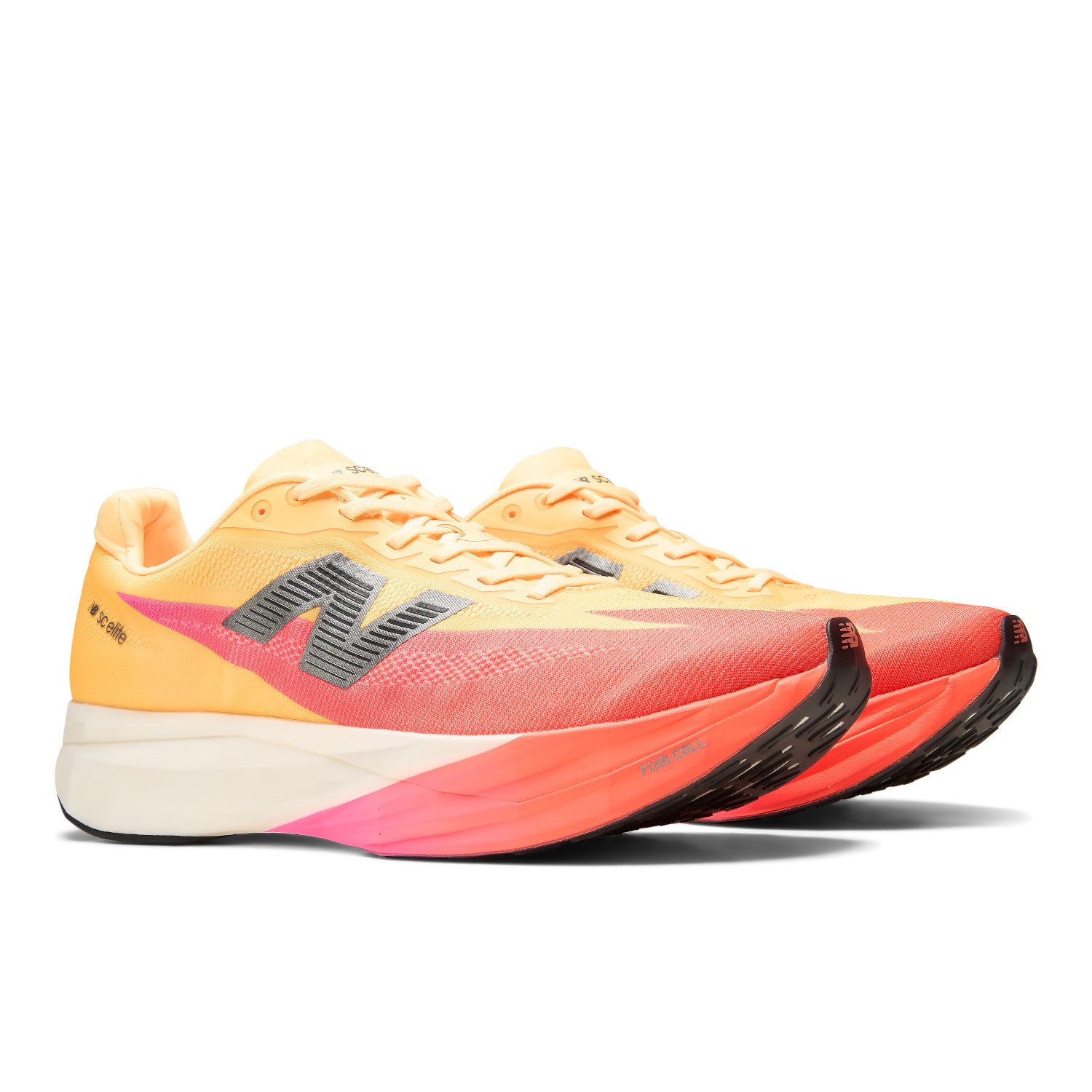 Yellow and pink running shoes with a visible brand logo on a white background