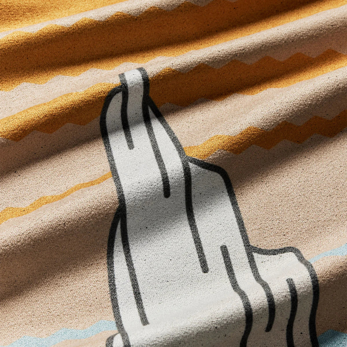 Close-up of a fabric with a llama design and striped pattern