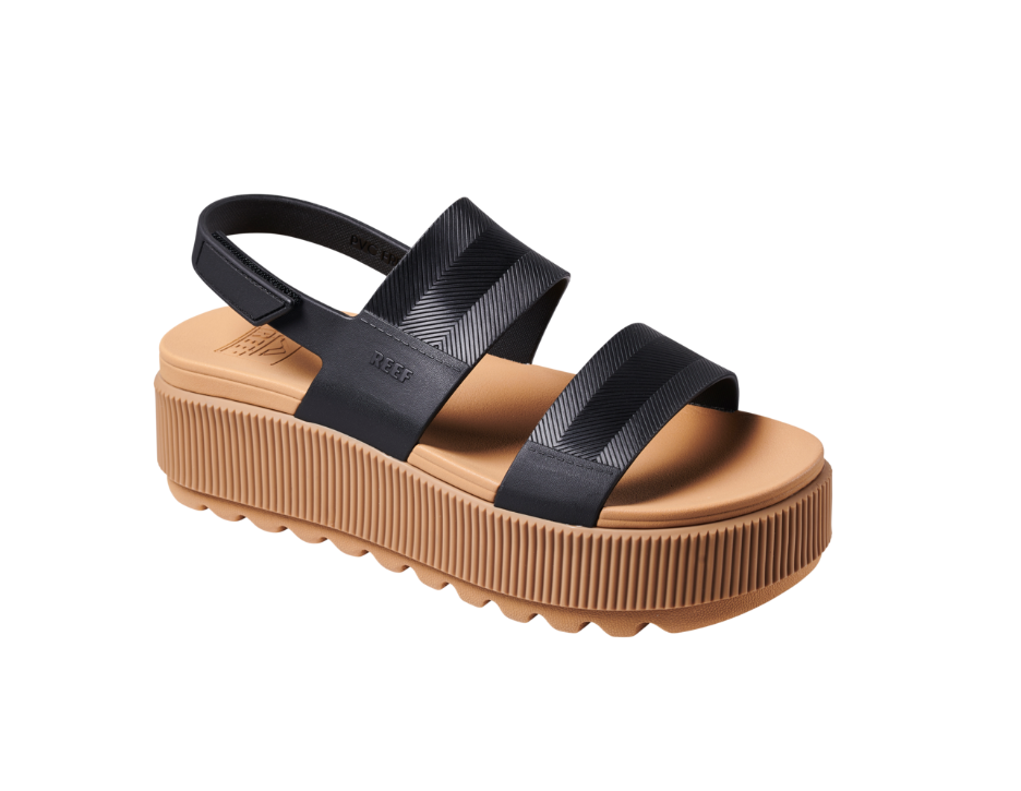 Black strappy sandal with a brown platform sole on a white background