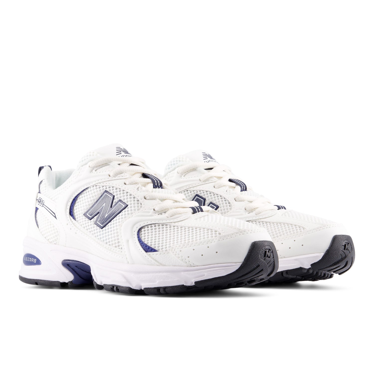 White sneakers with blue accents on a white background
