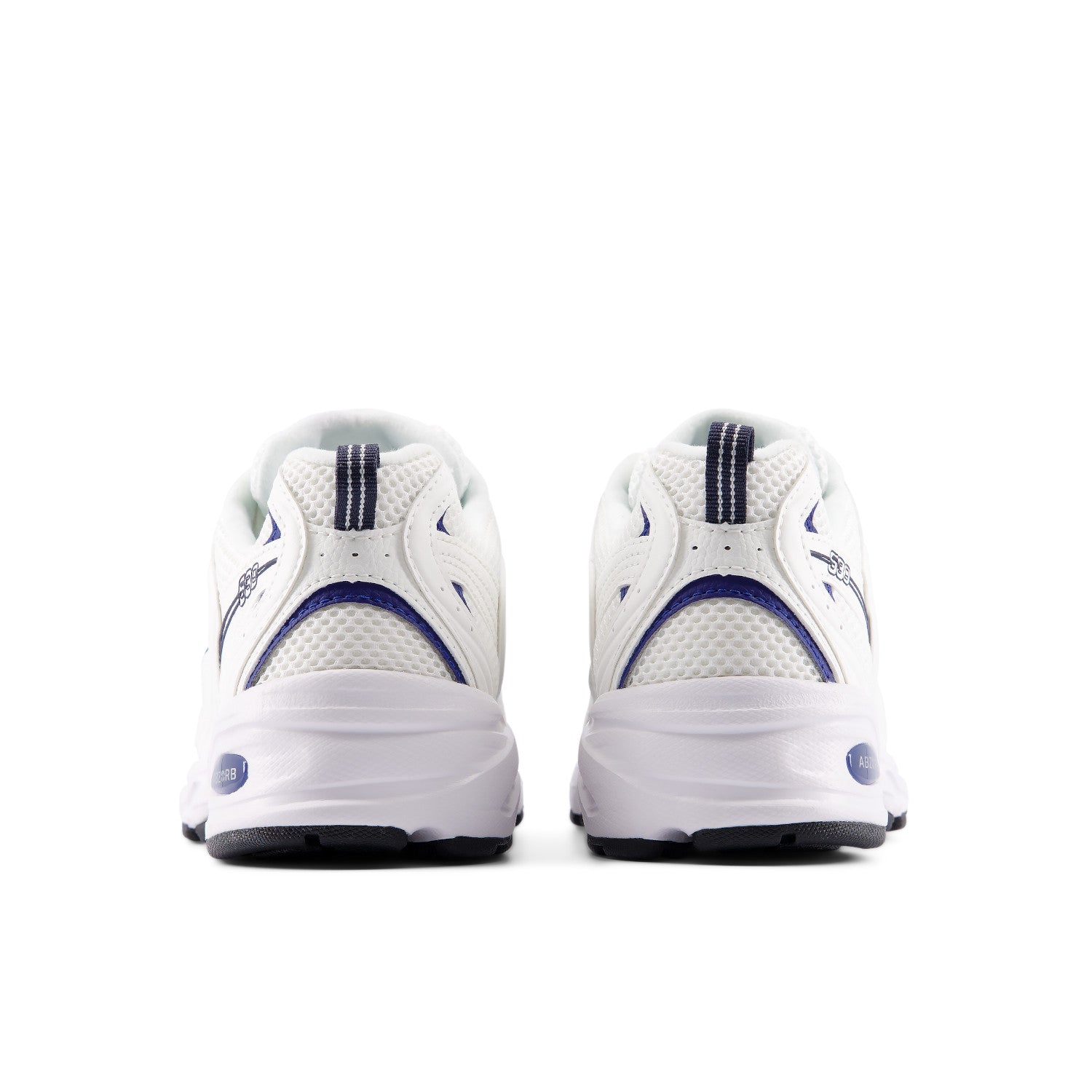 White athletic shoes with blue accents on a white background