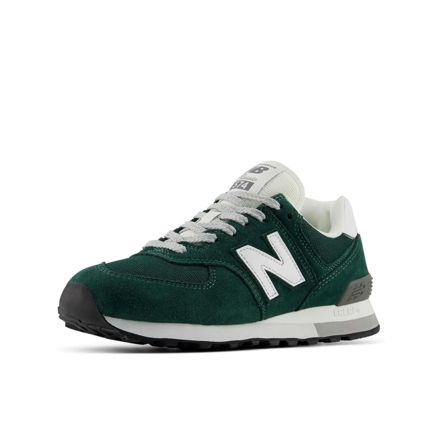 A New Balance sneaker in forest green suede with a white 'N' logo, white laces, and a white and gray midsole, shown from a side profile on a white background.