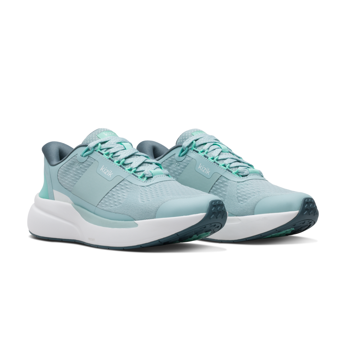 Pair of light blue running shoes on a white background