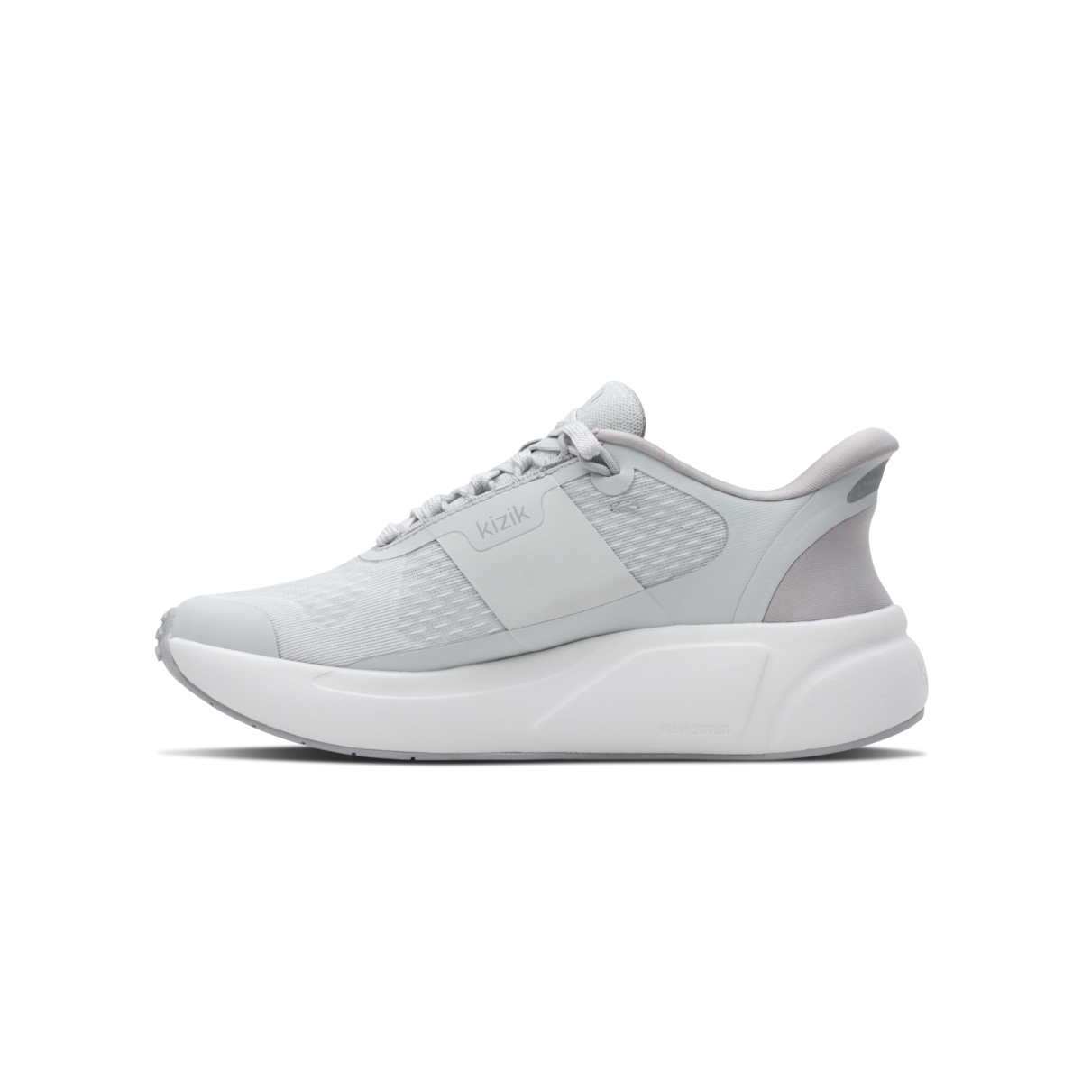 Gray athletic shoe on a black background