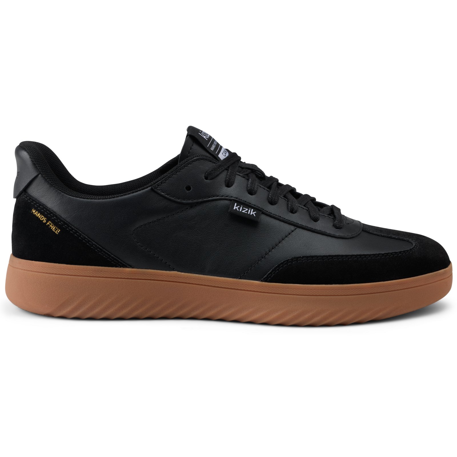 Black sneaker with brown sole on a white background