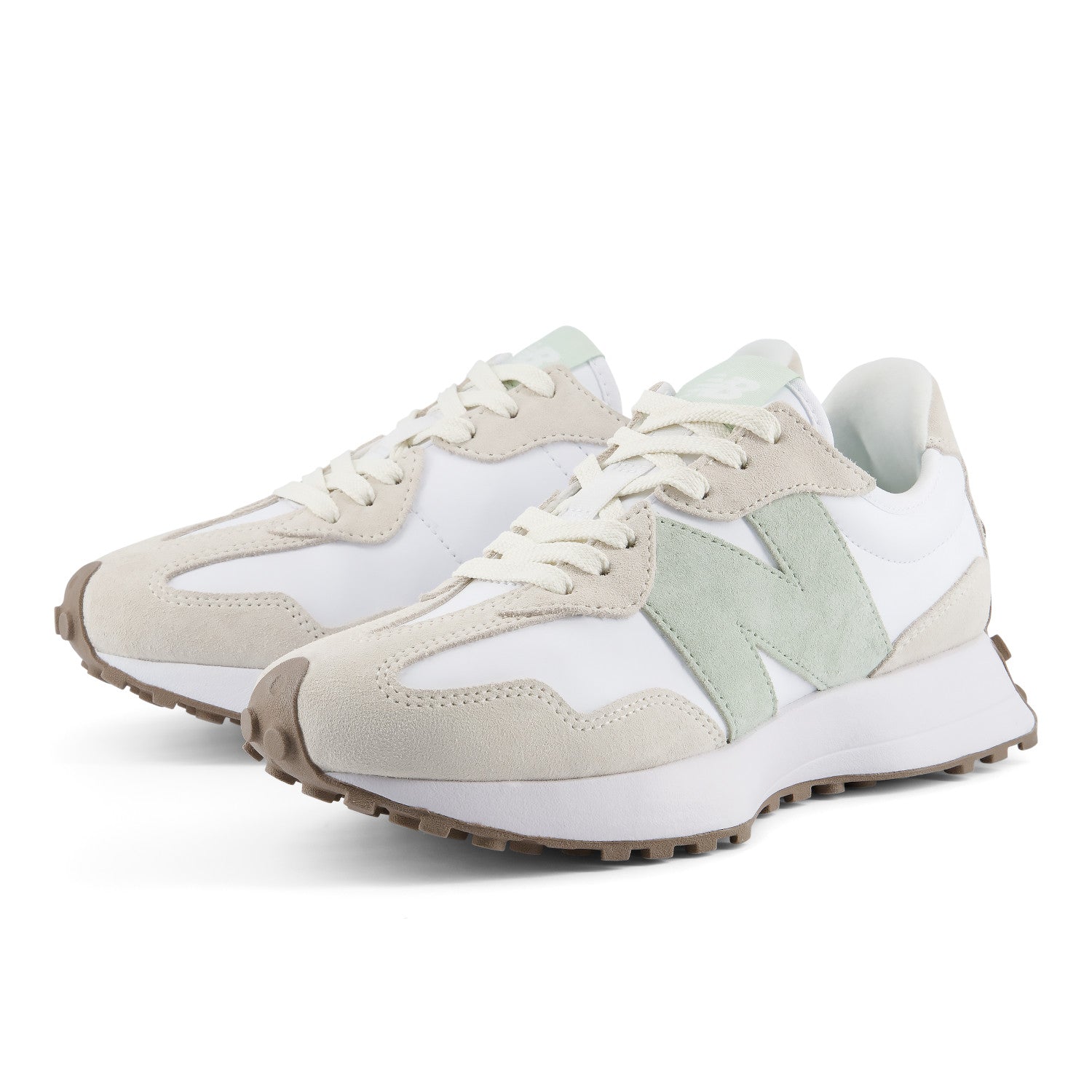 Pair of white and beige sneakers on a white background