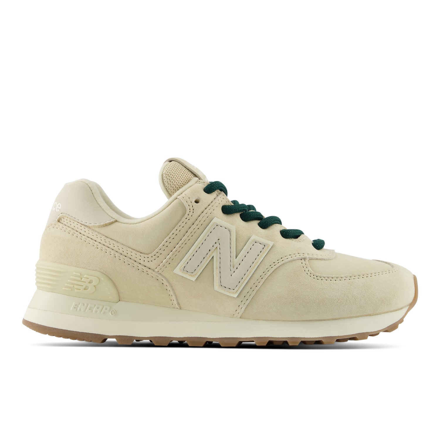Beige sneaker with green laces on a white background