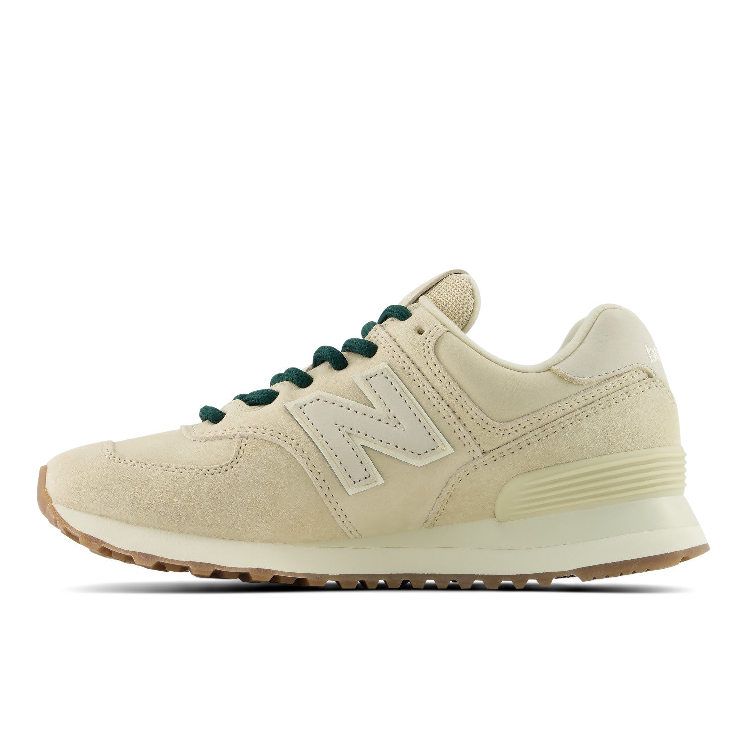 Beige sneaker with green laces on a white background
