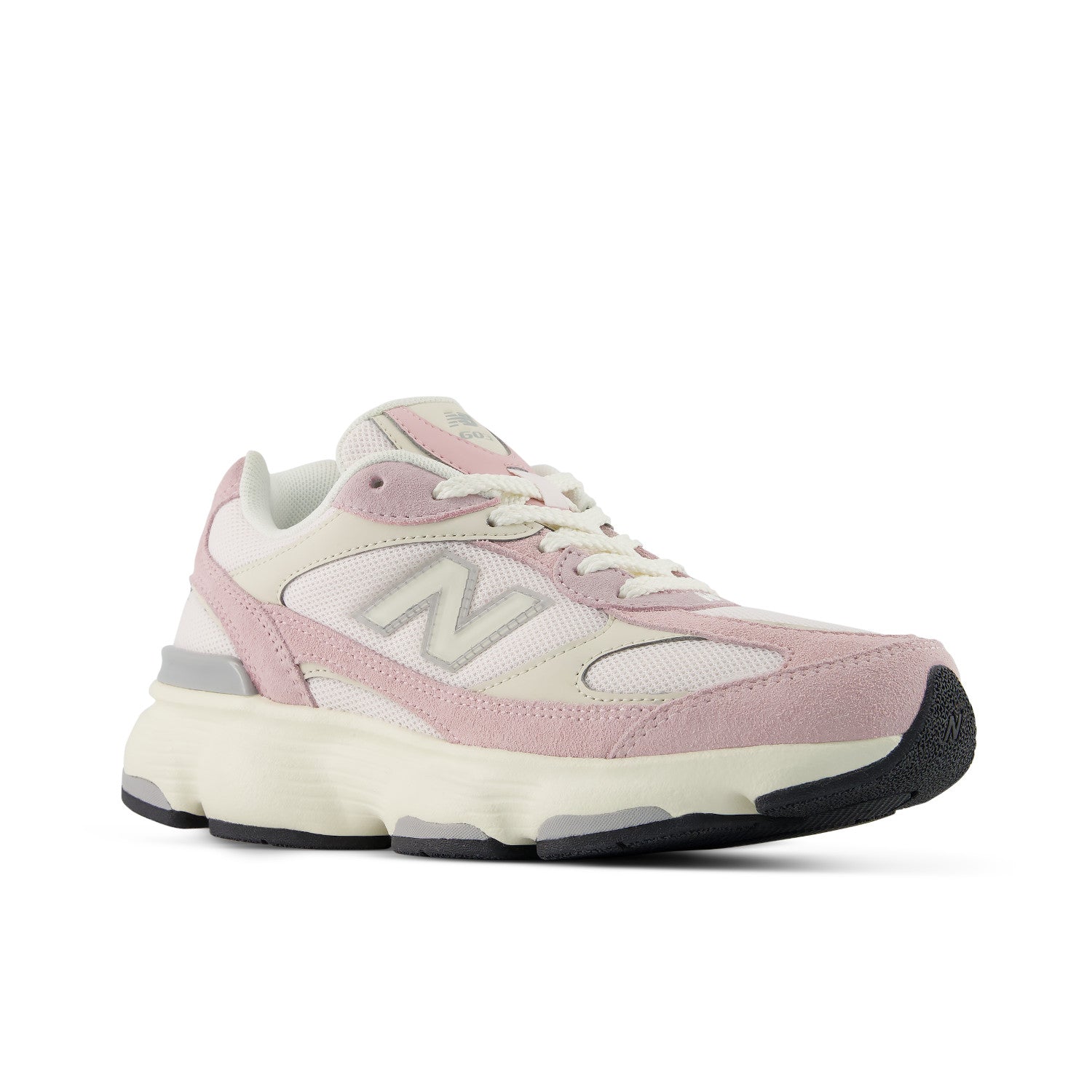 A New Balance sneaker in light pink, cream, and white, featuring a chunky sole and the signature 'N' logo on the side, set against a plain white background.