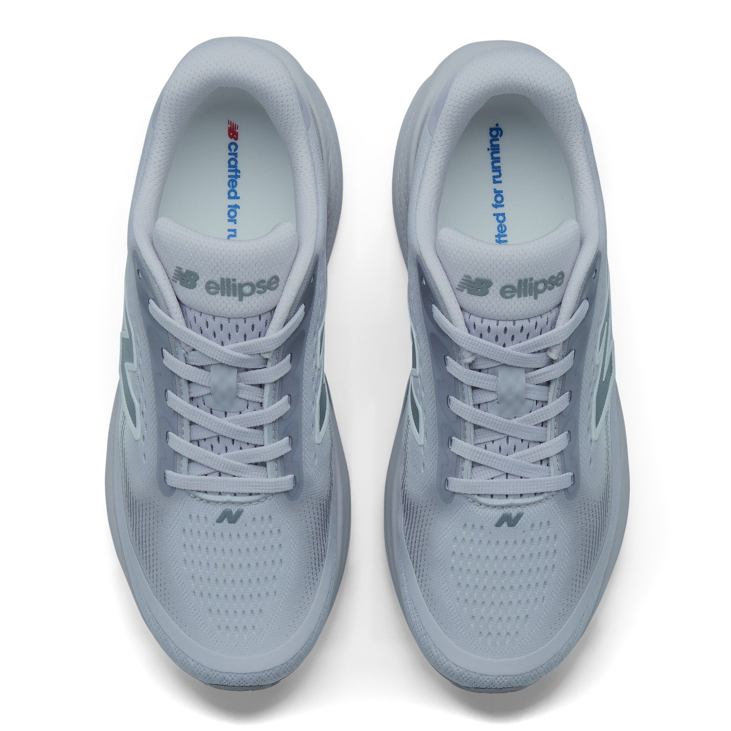 A pair of New Balance Ellipse running shoes in a light gray color, shown from a top-down view on a white background.